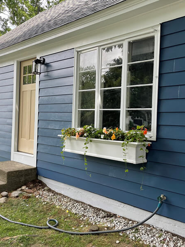 Exterior painting of a single family home.