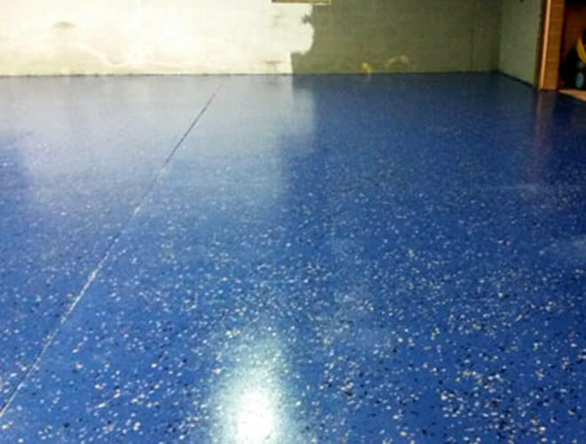 Finished blue speckled floor, with multi-colored speckles.