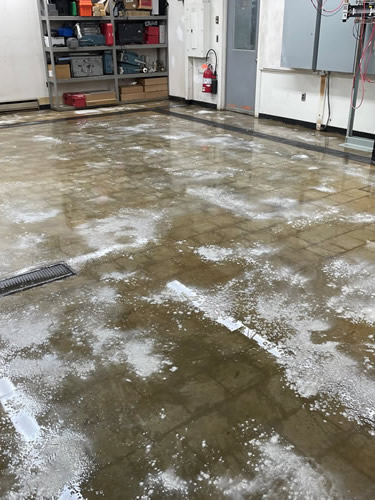 Cinderblock floor during the finishing process