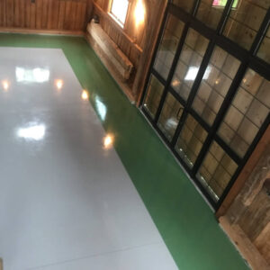 White floor with green boarder.