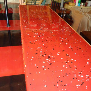 Red speckled bar with red and black checked floor.